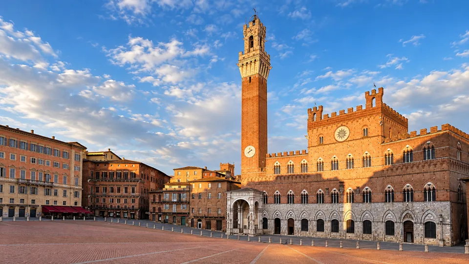 Shell shaped Piazza del Campo with brick tower