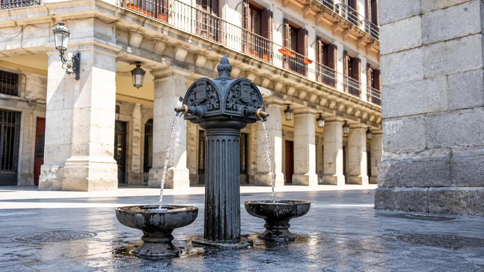 Realistic public drinking fountain detail in Madrid park