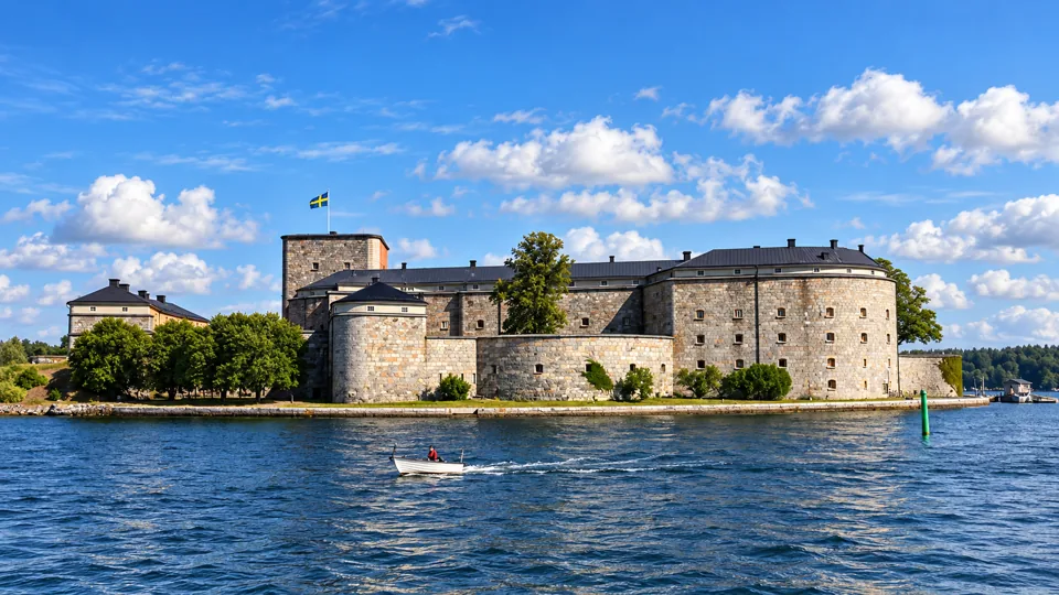 Vaxholm harbor with the fortress across the narrow water