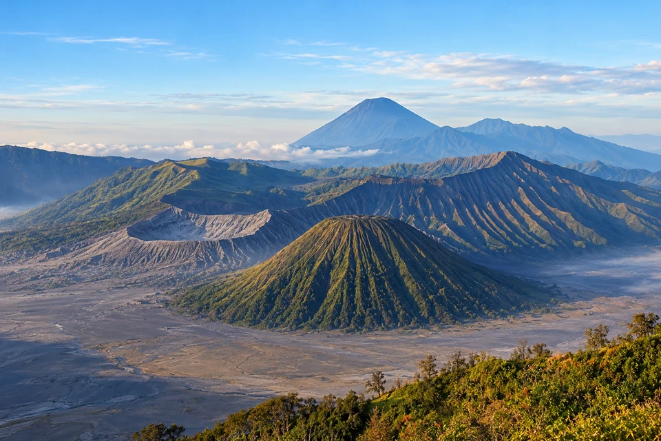 East Java's Tengger caldera with the Bromo crater, fluted Batok cone, Widodaren ridges and distant Semeru.
