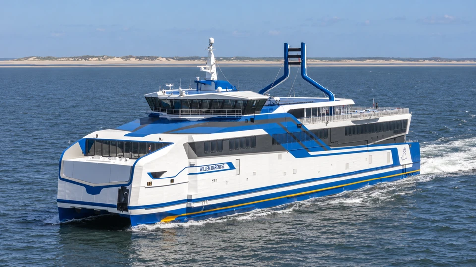 Rederij Doeksen's Willem Barentsz, an angular white-and-blue passenger and vehicle catamaran on the Wadden Sea.