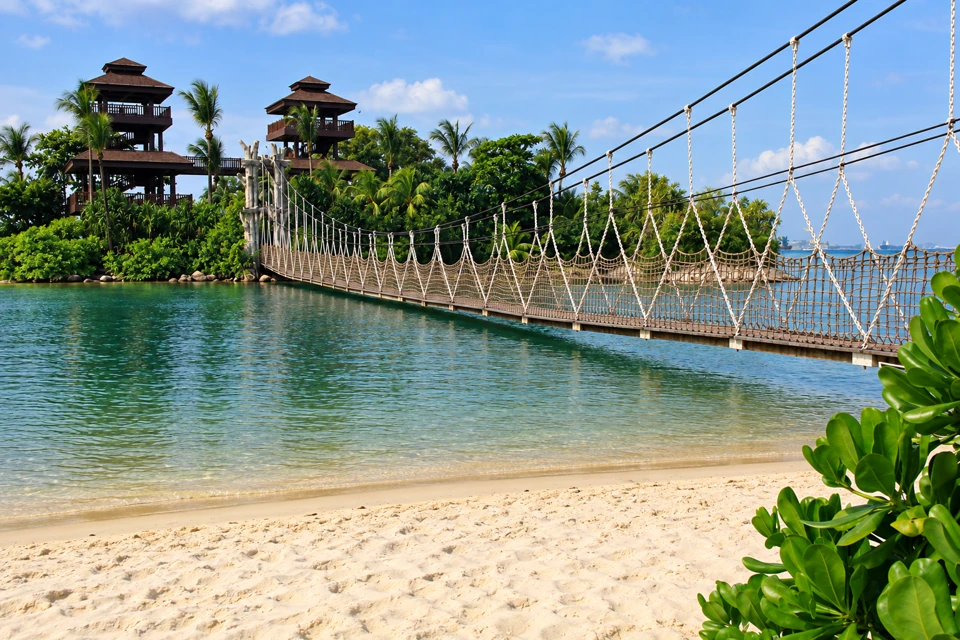 Palawan Beach suspension bridge leading to the two lookout towers on Sentosa.