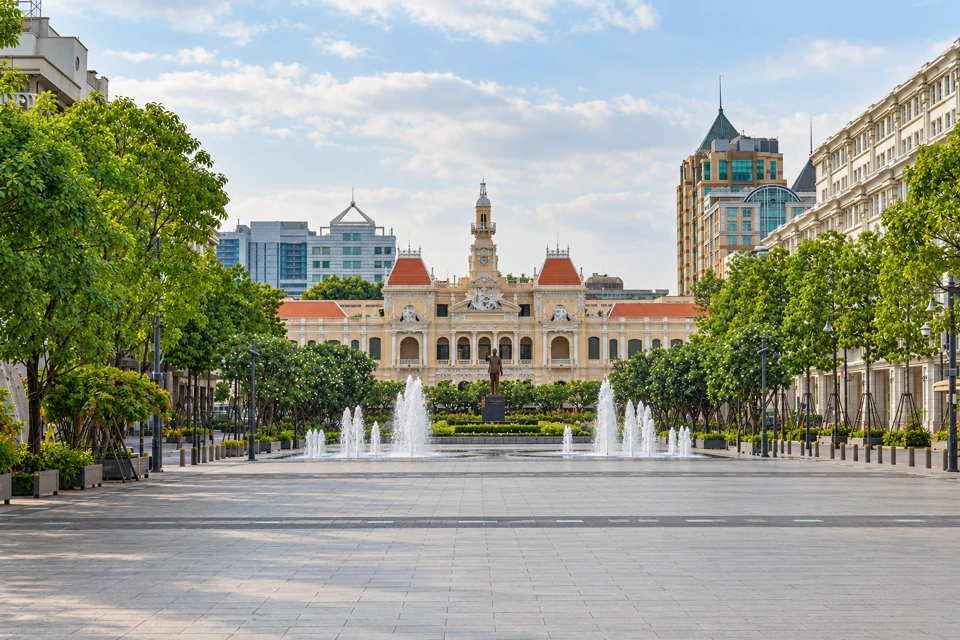 Nguyen Hue pedestrian promenade and fountains facing Ho Chi Minh City Hall