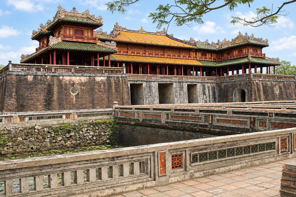 Ngo Mon gate and the tiled Five-Phoenix Pavilion behind the moat balustrades at Hue Imperial City.