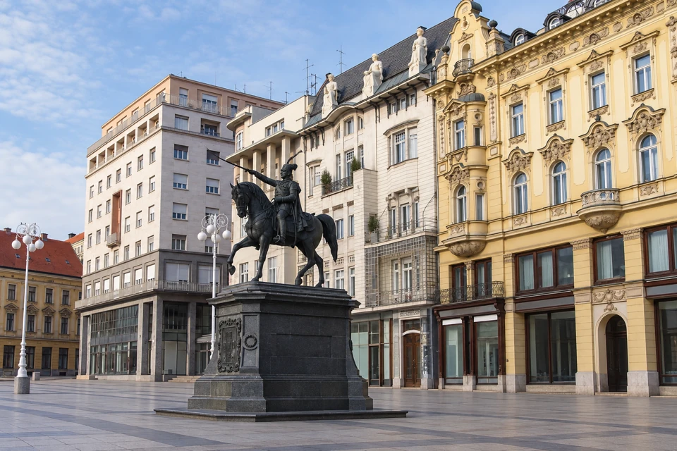 The bronze equestrian monument on Ban Jelacic Square stands in front of Zagreb's pale historic facades.